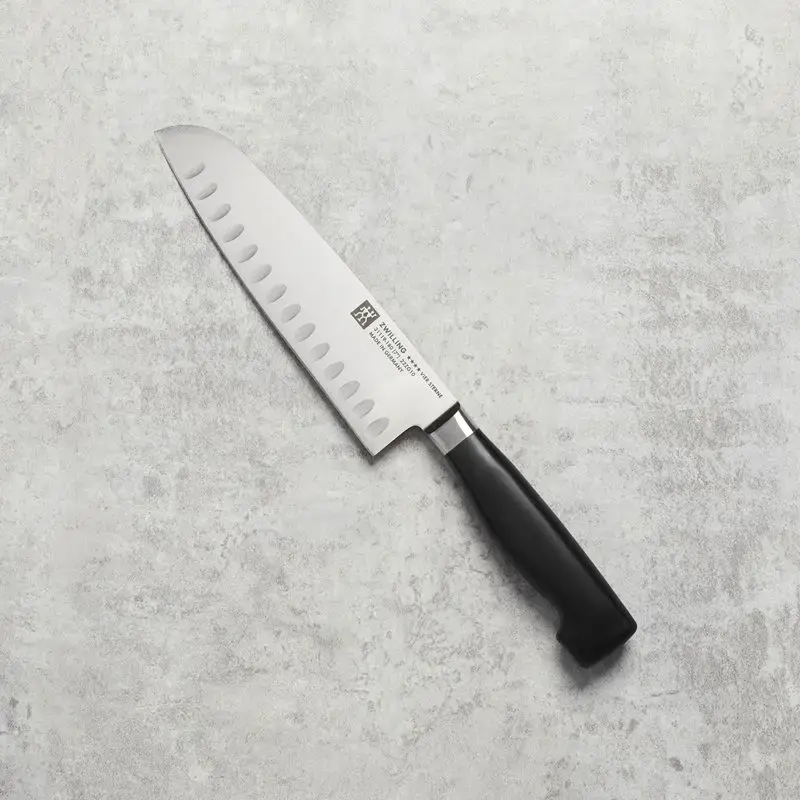 Zwilling Four Star santokukniv på 18cm i rustfrit stål med sort greb